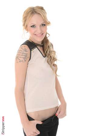 Stripper Picture of Belle Claire - Belle Claire came to us straight from the runway. Fashion is her passion and she is designing her own high end lingerie line for women that love women. Did we mention that Belle is a total bisexual. She loves a woman's curves and tells us there will always be both men and women in her personal life. Belle loves flirting and taking a woman home getting her naked and discovering where all her hidden tattoos are! She calls them artistic presents.