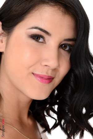 Stripper Picture of Lady Dee - Lady Dee is a beautiful brunette from the Czech Republic. Her petite and skinny stature has gained her fans the world over and we are proud to have her dancing with us. Lady Dee is smart well educated and incredibly witty. She has a magnetic personality that draws people to her and someday she hopes to practice psychology for that reason. But for now she is very happy getting to perform on stage. She tells us that it's a total rush to get naked in front of a camera and she enjoys the freedom of creating her own work hours. An avid reader Lady Dee's ideal date is to meet in a bookstore for a cup of coffee and discuss literature for hours. But she also likes getting dressed to the nines and hitting the town for the night!