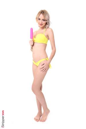 Stripper Picture of Arteya - Arteya is a 21 year old blonde beauty from Russia and she is beyond excited to be making her debut here. It may be hard to believe but Arteya describes herself as shy and introverted when she's not on stage. For that reason Arteya loves when fans come up and introduce themselves to her because it breaks the ice. But the second she hits that stage it's a different story. Arteya definitely gets off on performing for a crowd. It makes her feel sexy and horny all at the same time. In her personal life Arteya giggles as she tells us she loves foot play. She has a bit of a foot fetish and she always makes sure her toes are on point just in case someone wants to suckle on them!