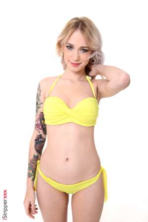 Stripper Picture of Arteya - Arteya is a 21 year old blonde beauty from Russia and she is beyond excited to be making her debut here. It may be hard to believe but Arteya describes herself as shy and introverted when she's not on stage. For that reason Arteya loves when fans come up and introduce themselves to her because it breaks the ice. But the second she hits that stage it's a different story. Arteya definitely gets off on performing for a crowd. It makes her feel sexy and horny all at the same time. In her personal life Arteya giggles as she tells us she loves foot play. She has a bit of a foot fetish and she always makes sure her toes are on point just in case someone wants to suckle on them!