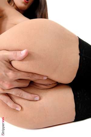 Stripper Picture of Carolina Abril - Carolina Abril is a fantastic brunette from Tenerife Canary Island Spain. She has exactly the temper of an islander! Full of energy jovial loving & friendly! She's just 25 and started her career in 2012. She has a piercing on her tongue and one on her navel. She poses very well and gives off a lot of sensuality and delicatessen.