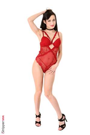 Stripper Picture of Nicole Love - Short visit of Nicole Love in our studios! She did not have a lot of time to spend with us but we thank her for having taken the time to visit her before she flyed back to Prague. Brunette with deep blue eyes a beautiful tatoo on her belly and a shy smile! Enjoy this rare apparition!