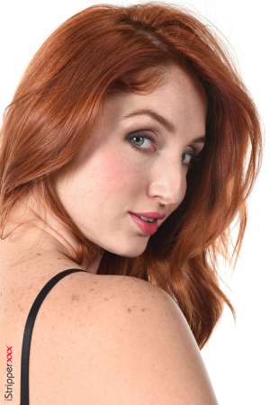 Stripper Picture of The Red Fox - Calling herself The Red Fox this beauty from the Ukraine considers herself a performance artist. Yes she is a stripper but every dance is intimate to her and she wants it to be incredibly intimate for you to watch. The Red Fox studied Art History and Acting at University which is when she started dancing erotically to pay for tuition. Soon she found it more pleasurable to dance on stage and feel the sexual energy generated by the crowd then to study from a book all day. And that is when The Red Fox was created. Now you can enjoy every curve of her body and every roll of her hip as often as you want when you download her world famous stage shows.