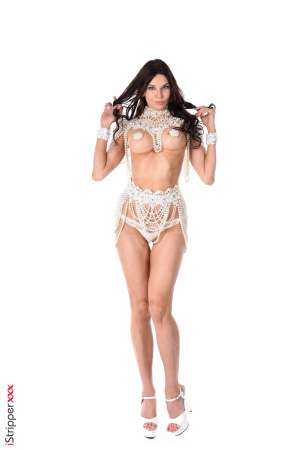 Stripper Picture of Baileys - Here is our new Diva named Baileys. One meter eighty long brown hair intense blue eyes and infinite legs. Sometimes femme fatale sometimes reserved full of surprises and very playful this incredible woman has the ability to transport you in a few seconds in her vibrant & expectional erotic universe.