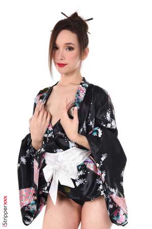 Stripper Picture of Ellie Leen - Ellie Leen comes from Russia she is 22 years old. Ellie has a sweet little body and a shy smile she is very delicate and has a lot of sensuality. She started her career as a cam girl (still her main activity) and she rarely accepts to work for some external productions which makes her presence on iStripper even more precious! Ellie is a cameleon it was a real pleasure getting her wear very different outfits and styles which all suited her so well! No doubt you will enjoy her performances!!!