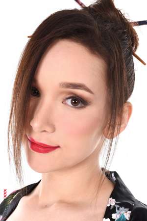 Stripper Picture of Ellie Leen - Ellie Leen comes from Russia she is 22 years old. Ellie has a sweet little body and a shy smile she is very delicate and has a lot of sensuality. She started her career as a cam girl (still her main activity) and she rarely accepts to work for some external productions which makes her presence on iStripper even more precious! Ellie is a cameleon it was a real pleasure getting her wear very different outfits and styles which all suited her so well! No doubt you will enjoy her performances!!!