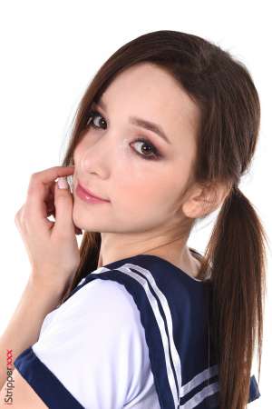 Stripper Picture of Ellie Leen - Ellie Leen comes from Russia she is 22 years old. Ellie has a sweet little body and a shy smile she is very delicate and has a lot of sensuality. She started her career as a cam girl (still her main activity) and she rarely accepts to work for some external productions which makes her presence on iStripper even more precious! Ellie is a cameleon it was a real pleasure getting her wear very different outfits and styles which all suited her so well! No doubt you will enjoy her performances!!!