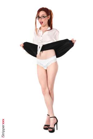 Stripper Picture of Sherice - Sherice is a redhead beauty from Russia where she's born 20 years ago. She's very slim and sensual with long hair and a natural ability to play all kinds of roles :) Sherice studies economics at the university her goal is to enter an international company and possibly move to the USA. Apart from that she plays bass and already performed several concerts with her band!