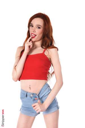 Stripper Picture of Sherice - Sherice is a redhead beauty from Russia where she's born 20 years ago. She's very slim and sensual with long hair and a natural ability to play all kinds of roles :) Sherice studies economics at the university her goal is to enter an international company and possibly move to the USA. Apart from that she plays bass and already performed several concerts with her band!